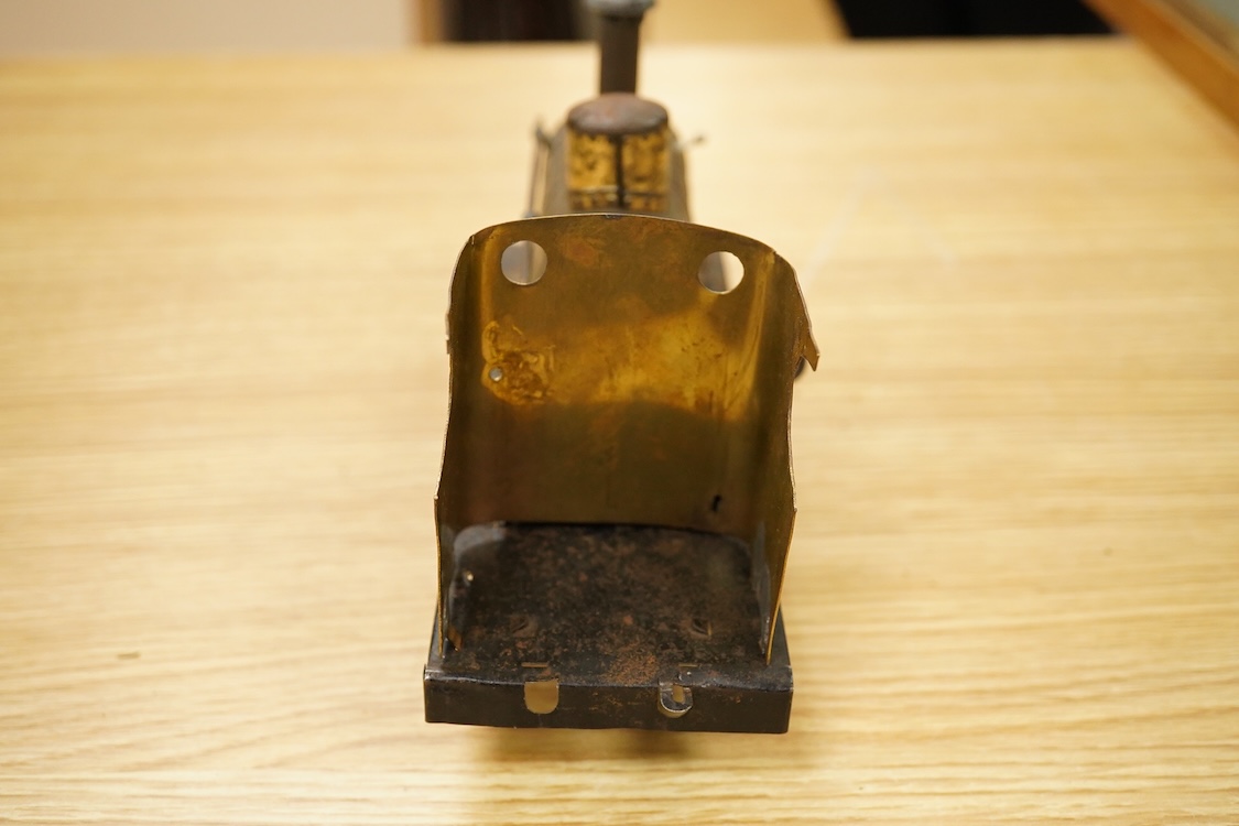 Seven Gauge One coarse scale railway freight wagons, by Bassett-Lowke, etc., including tinplate and wooden examples in liveries for LNWR, Midland Railway, and LBSCR, together with the remains of a scarce late 19th centur